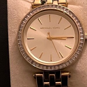 Women’s Michael Kors gold tone watch